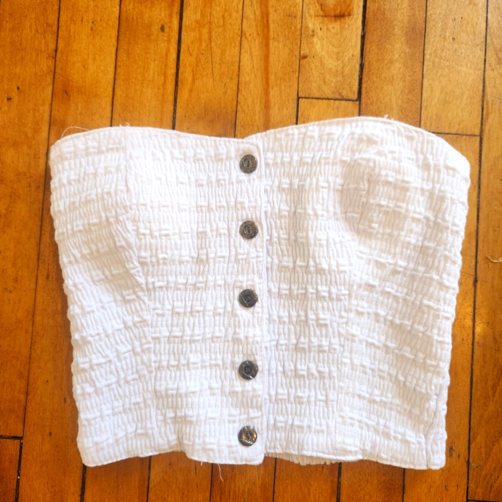 Tube button front top